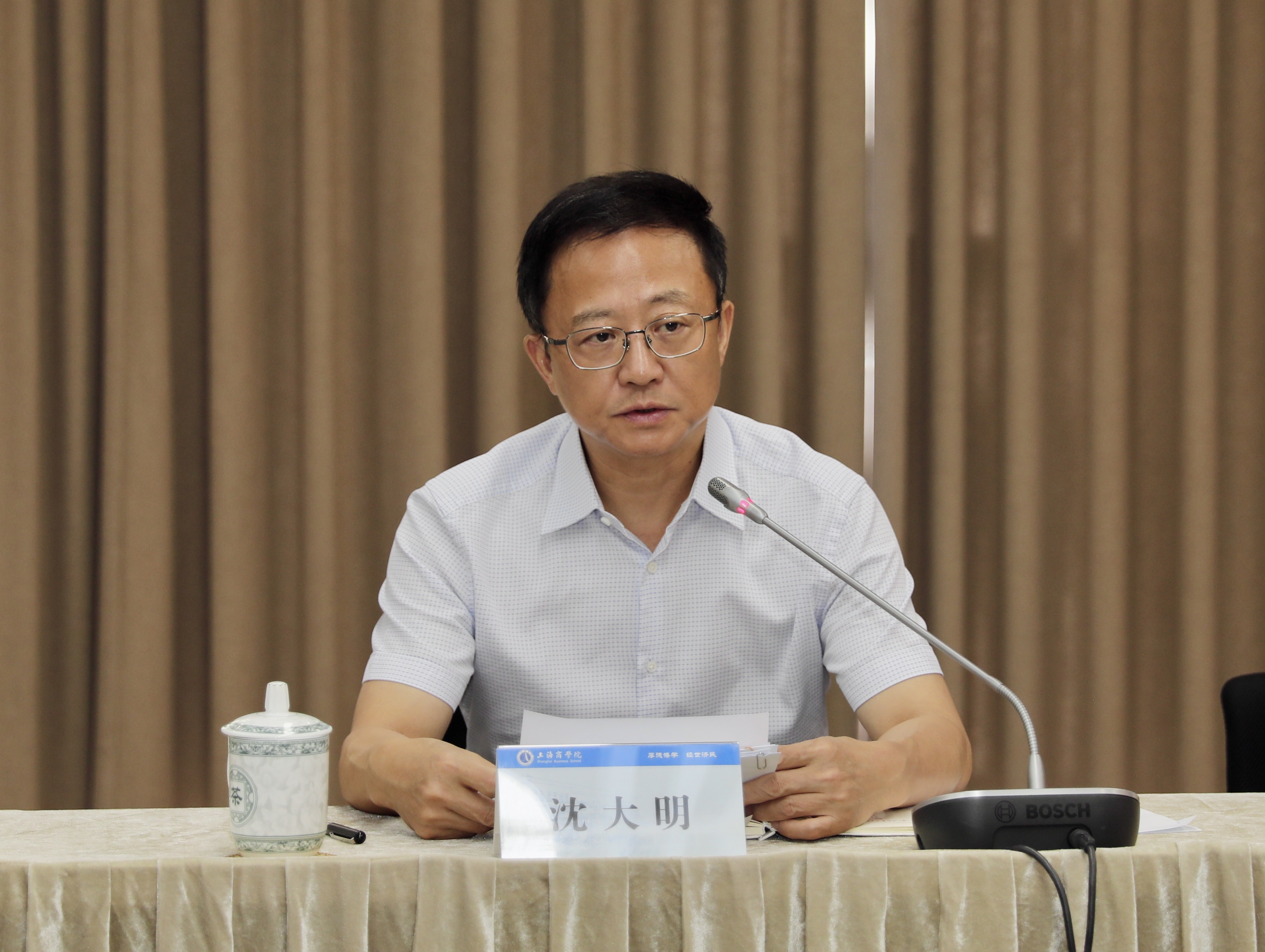 图为沈大明讲话